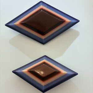 "Festive" Pair of acetate pins.